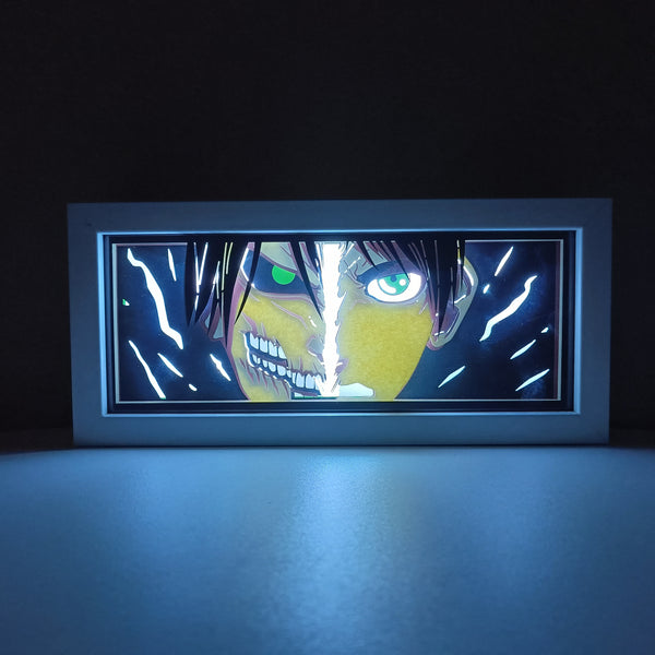 Attack on Titan anime light box with 3D paper carving and LED RGB lighting. Featuring Eren Yeager and the Colossal Titan, this custom handmade light box offers remote-controlled color options like blue, red, and white, perfect for bedroom or desk decor. Ideal for fans of the Survey Corps and humanity’s fight for survival, this light box brings the apocalyptic world of Attack on Titan to life