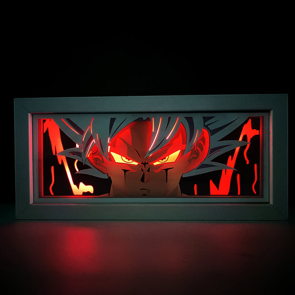 Custom Dragon Ball Z anime light box with 3D paper carving and RGB LED lights featuring Goku and Vegeta. Perfect for anime gifts, Christmas decorations, and decor for fans and collectors. Remote-controlled colors create a powerful, Super Saiyan-level ambiance for bedrooms, desks, or anime-themed spaces. This handmade piece is an ideal gift for holidays or birthdays, designed for lovers of epic battles, Kamehameha energy blasts, and iconic Saiyan transformations. A must-have for Dragon Ball Z fans.