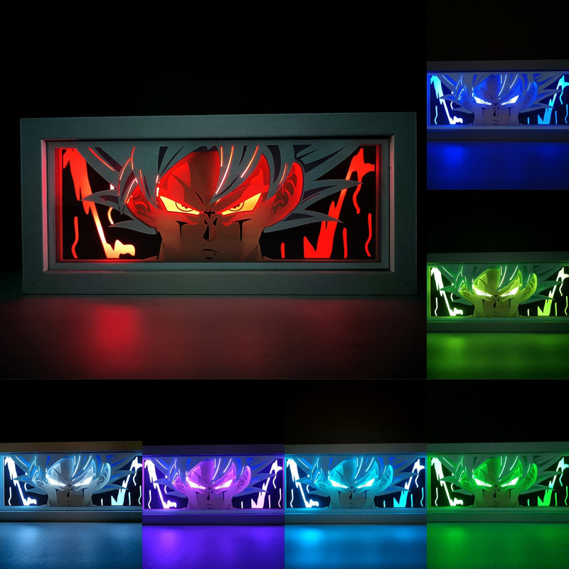 Custom Dragon Ball Z anime light box with 3D paper carving and RGB LED lights featuring Goku and Vegeta. Perfect for anime gifts, Christmas decorations, and decor for fans and collectors. Remote-controlled colors create a powerful, Super Saiyan-level ambiance for bedrooms, desks, or anime-themed spaces. This handmade piece is an ideal gift for holidays or birthdays, designed for lovers of epic battles, Kamehameha energy blasts, and iconic Saiyan transformations. A must-have for Dragon Ball Z fans.