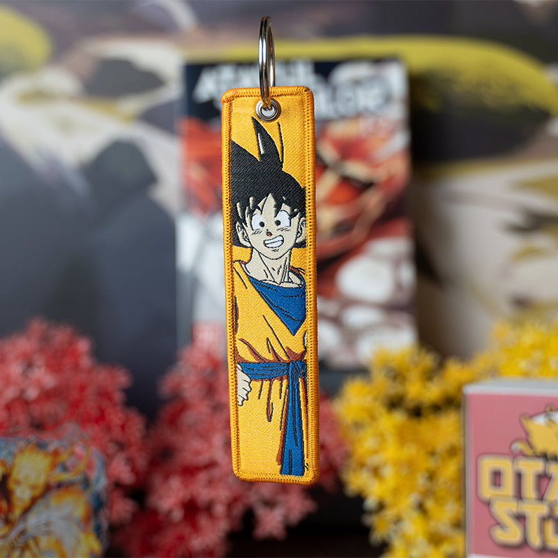 Legendary Dragon Ball Embroidered Jet Tag featuring high-quality stitching of Goku, Vegeta, and the iconic Dragon Ball symbol. Made from durable materials, this double-sided jet tag brings the power and excitement of the series to life. Perfect for keys, backpacks, or adding a touch of Saiyan strength to your car, it’s a must-have collectible for Dragon Ball fans and anime enthusiasts looking to carry the energy of their favorite heroes wherever they go!