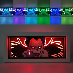 Custom Death Note anime light box with 3D paper carving and RGB LED lights featuring Light Yagami and Ryuk. Perfect for anime gifts, Christmas decorations, and decor for fans and collectors. Remote-controlled colors create a dark, mysterious ambiance for bedrooms, desks, or anime-themed spaces. This handmade piece is an ideal gift for holidays or birthdays, designed for lovers of psychological thrillers and iconic anime decor. A must-have for Death Note fans looking to enhance their collection.