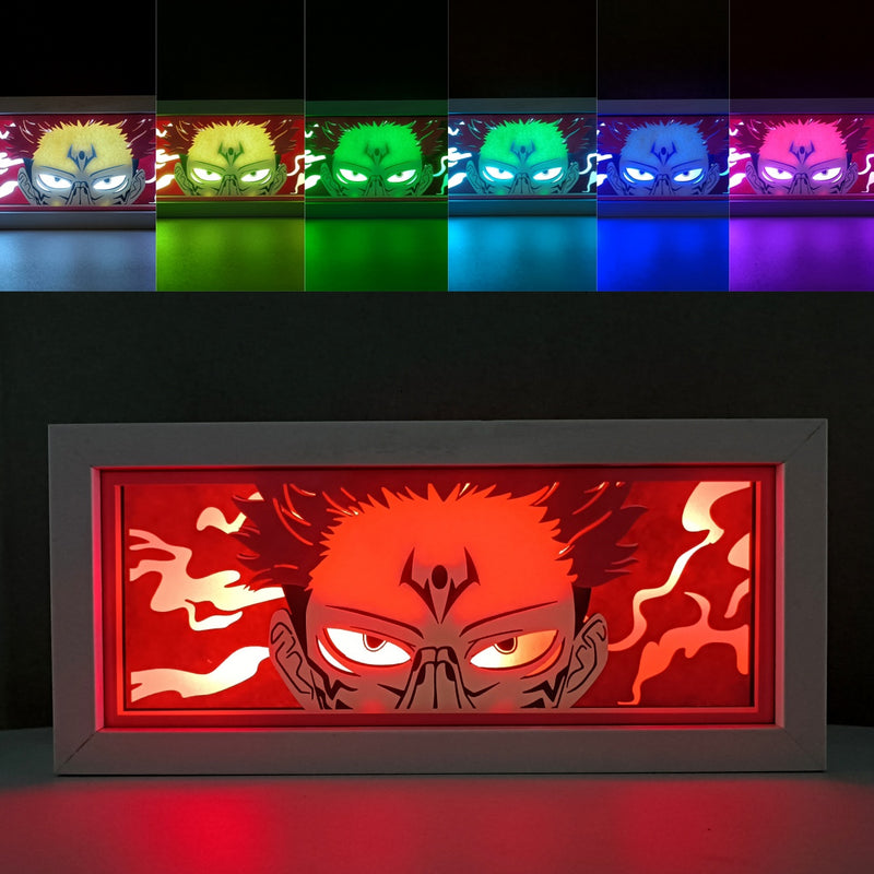 Jujutsu Kaisen anime light box with 3D paper carving and LED RGB lighting, featuring Yuji Itadori, Gojo Satoru, and Sukuna. This custom handmade light box brings the intense sorcery battles to life with remote-controlled color options, perfect for adding a supernatural vibe to any bedroom, desk, or anime-inspired space