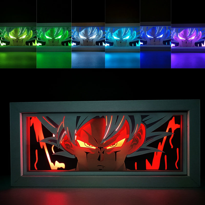 Custom Dragon Ball Z anime light box with 3D paper carving and RGB LED lights featuring Goku and Vegeta. Perfect for anime gifts, Christmas decorations, and decor for fans and collectors. Remote-controlled colors create a powerful, Super Saiyan-level ambiance for bedrooms, desks, or anime-themed spaces. This handmade piece is an ideal gift for holidays or birthdays, designed for lovers of epic battles, Kamehameha energy blasts, and iconic Saiyan transformations. A must-have for Dragon Ball Z fans.