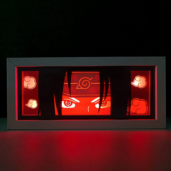 Custom Naruto light box with 3D paper carving and RGB LED lights featuring Itachi Uchiha. Perfect for anime gifts, Christmas decor, and Itachi fans. Remote-controlled colors create a mysterious, powerful ambiance for any space. Ideal for holidays, birthdays, or special occasions, celebrating Itachi’s mastery of the Mangekyō Sharingan and his complex, tragic story. A must-have for Naruto fans looking to honor the legacy of the Uchiha clan with this iconic character.