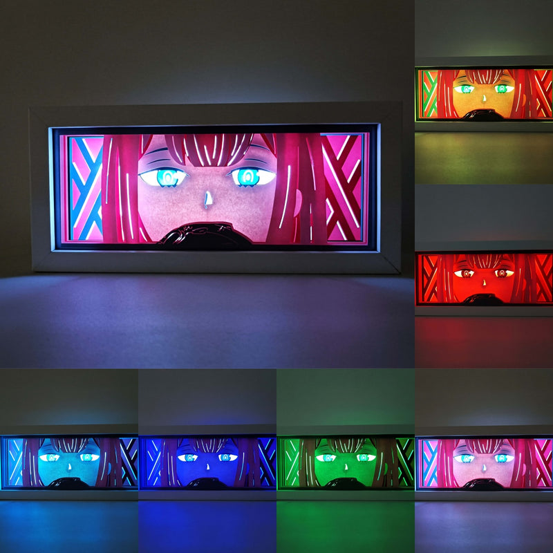 Custom Darling in the Franxx anime light box with 3D paper carving and RGB LED lights featuring Hiro and Zero Two. Perfect for anime gifts, Christmas decorations, and decor for fans and collectors. Remote-controlled colors create a futuristic ambiance for bedrooms, desks, or anime-themed spaces. This handmade piece is an ideal gift for holidays or birthdays, designed for lovers of emotional mecha action and eye-catching anime decor. A must-have for Darling in the Franxx fans to enhance their collection