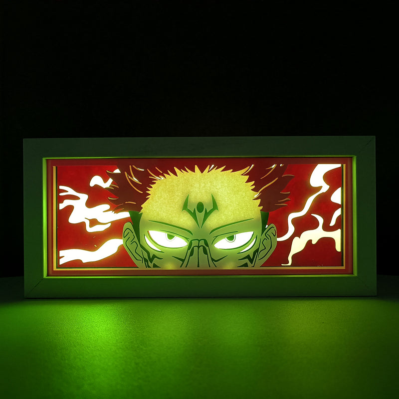 Jujutsu Kaisen anime light box with 3D paper carving and LED RGB lighting, featuring Yuji Itadori, Gojo Satoru, and Sukuna. This custom handmade light box brings the intense sorcery battles to life with remote-controlled color options, perfect for adding a supernatural vibe to any bedroom, desk, or anime-inspired space