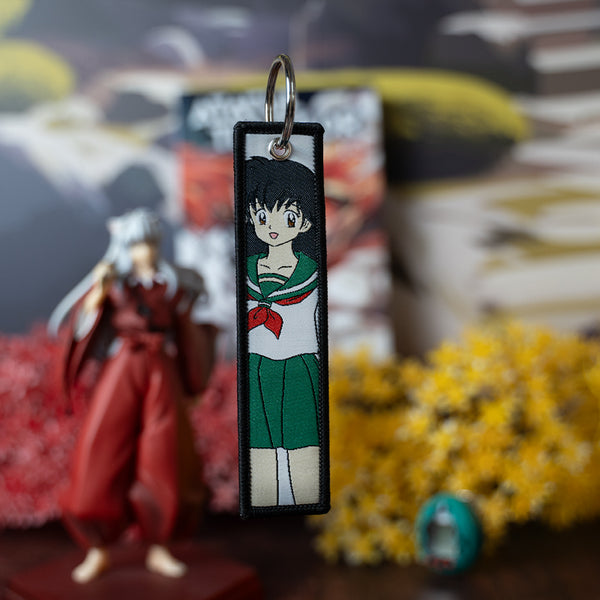 Timeless Inuyasha Embroidered Jet Tag featuring high-quality stitching of Inuyasha, Kagome, and the Sacred Jewel shard. Made from durable materials, this double-sided jet tag captures the romance and action of the series. Perfect for keys, backpacks, or adding a nostalgic touch to your car, it’s a must-have collectible for Inuyasha fans and anime lovers who want to carry the magic of feudal Japan with them everywhere!