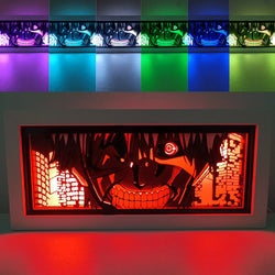 Custom Tokyo Ghoul light box with 3D paper carving and RGB LED lights featuring Ken Kaneki. Perfect for anime gifts, Christmas decor, and Tokyo Ghoul fans. Remote-controlled colors create a dark, intense ambiance for any space. Ideal for holidays, birthdays, or special occasions, celebrating Kaneki’s transformation, his struggle between human and ghoul, and his iconic mask. A must-have for Tokyo Ghoul fans looking to showcase the thrilling, haunting world of ghouls.