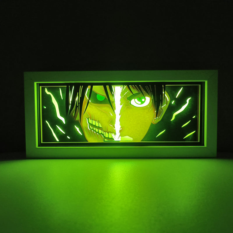 Attack on Titan anime light box with 3D paper carving and LED RGB lighting. Featuring Eren Yeager and the Colossal Titan, this custom handmade light box offers remote-controlled color options like blue, red, and white, perfect for bedroom or desk decor. Ideal for fans of the Survey Corps and humanity’s fight for survival, this light box brings the apocalyptic world of Attack on Titan to life