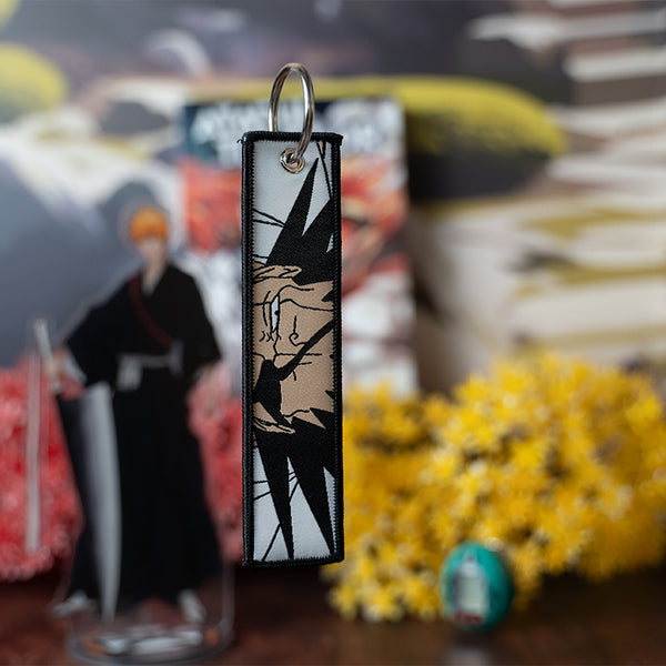 Striking Bleach Embroidered Jet Tag featuring high-quality stitching of Ichigo, Rukia, and Renji. Made from durable materials, this double-sided jet tag showcases bold, detailed embroidery that brings the intense battles and spirit world of Bleach to life. Perfect for keys, backpacks, or adding a touch of Soul Reaper style to your car. A must-have collectible and the perfect gift for Bleach fans and anime lovers who want to carry the power and essence of Ichigo and the Soul Society wherever they go!