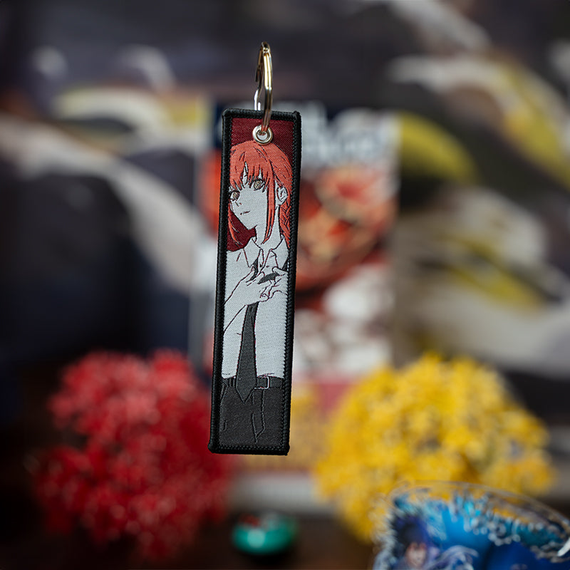 Bold Chainsaw Man Embroidered Jet Tag featuring high-quality stitching of Denji, Power, and Aki. Made from durable materials, this double-sided jet tag captures the thrilling chaos and dark humor of the series. Perfect for keys, backpacks, or adding a fierce touch to your car, it’s a must-have collectible for Chainsaw Man fans and anime enthusiasts looking to carry the devil-hunting spirit with them everywhere!