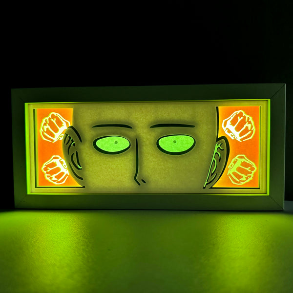 Custom One Punch Man light box with 3D paper carving and RGB LED lights featuring Saitama. Perfect for anime gifts, Christmas decor, and One Punch Man fans. Remote-controlled colors create a bold, minimalist ambiance for any space. Ideal for holidays, birthdays, or special occasions, celebrating Saitama’s unmatched strength, effortless victories, and laid-back attitude. A must-have for fans looking to honor the hero who can defeat any foe with just one punch.