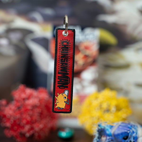 Bold Chainsaw Man Embroidered Jet Tag featuring high-quality stitching of Denji, Power, and Aki. Made from durable materials, this double-sided jet tag captures the thrilling chaos and dark humor of the series. Perfect for keys, backpacks, or adding a fierce touch to your car, it’s a must-have collectible for Chainsaw Man fans and anime enthusiasts looking to carry the devil-hunting spirit with them everywhere!