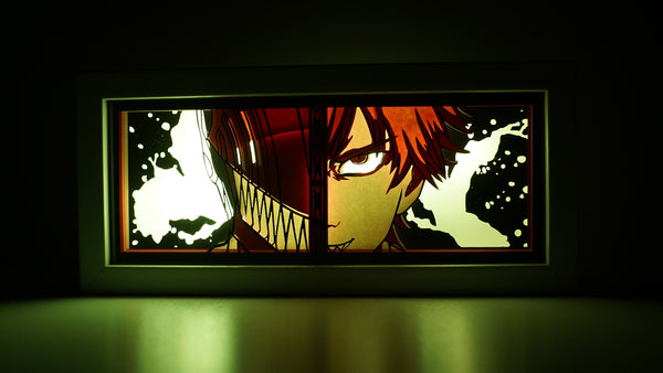 hainsaw Man anime light box with 3D paper carving and LED RGB lights, featuring Denji and Pochita. This custom handmade light box brings the intense action of Chainsaw Man to life with remote-controlled colors. Perfect for adding a gritty, rebellious touch to your bedroom, desk, or anime-themed decor