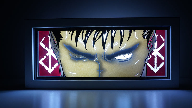 Berserk anime light box featuring Guts in dark, powerful 3D paper carving with LED RGB lights. Handcrafted for fans of this dark fantasy, the light box offers remote color control and flickering tealight effects, perfect for adding a brooding, gothic touch to your bedroom, desk, or home decor