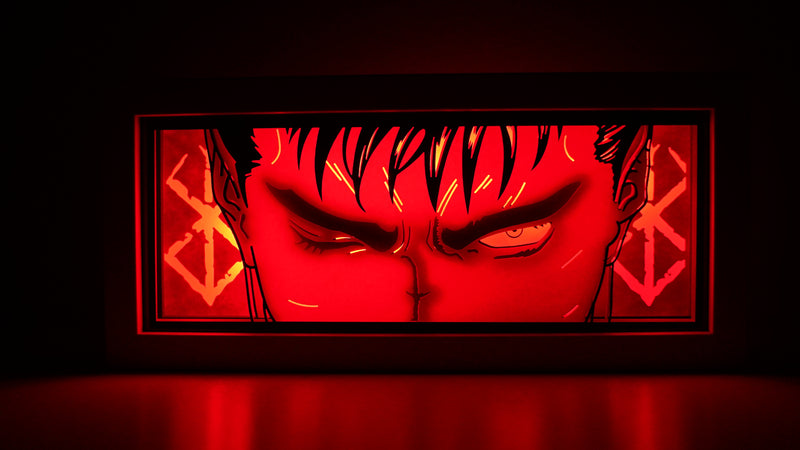 Berserk anime light box featuring Guts in dark, powerful 3D paper carving with LED RGB lights. Handcrafted for fans of this dark fantasy, the light box offers remote color control and flickering tealight effects, perfect for adding a brooding, gothic touch to your bedroom, desk, or home decor