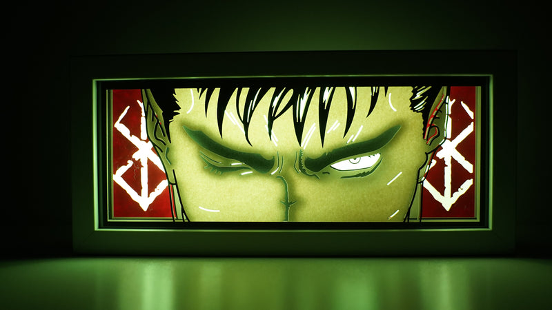 Berserk anime light box featuring Guts in dark, powerful 3D paper carving with LED RGB lights. Handcrafted for fans of this dark fantasy, the light box offers remote color control and flickering tealight effects, perfect for adding a brooding, gothic touch to your bedroom, desk, or home decor