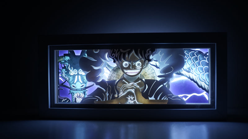 Custom One Piece light box with 3D paper carving and RGB LED lights featuring Luffy in Gear 5 form. Perfect for anime gifts, Christmas decor, and Luffy fans. Remote-controlled colors create an epic, electrifying ambiance for any space. Ideal for holidays, birthdays, or special occasions, celebrating Luffy’s ultimate transformation, wild power, and his quest to become the Pirate King. A must-have for One Piece fans looking to showcase Luffy’s most powerful form.