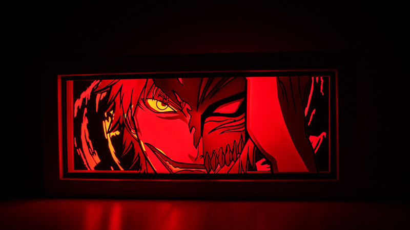 Bleach anime light box with custom 3D paper carving and LED RGB lighting. Featuring Ichigo Kurosaki in his Soul Reaper form, this handmade light box offers remote-controlled colors and is perfect for adding a dynamic, spiritual vibe to your home decor. Ideal for Bleach fans and anime lovers