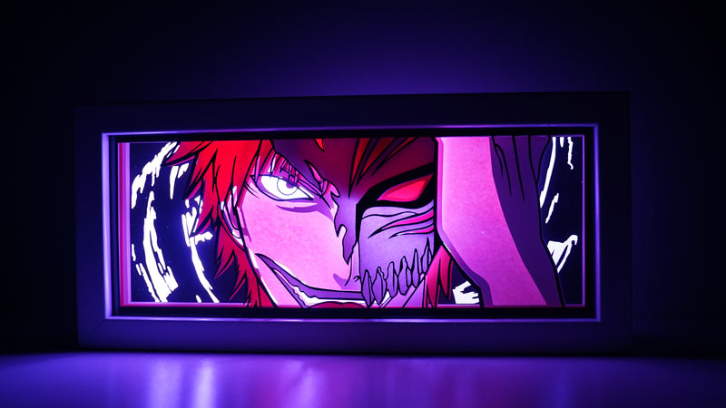 Bleach anime light box with custom 3D paper carving and LED RGB lighting. Featuring Ichigo Kurosaki in his Soul Reaper form, this handmade light box offers remote-controlled colors and is perfect for adding a dynamic, spiritual vibe to your home decor. Ideal for Bleach fans and anime lovers