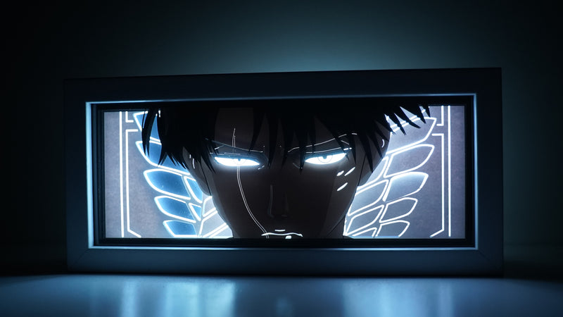 Attack on Titan anime light box with 3D paper carving and LED RGB lighting. Featuring Eren Yeager and the Colossal Titan, this custom handmade light box offers remote-controlled color options like blue, red, and white, perfect for bedroom or desk decor. Ideal for fans of the Survey Corps and humanity’s fight for survival, this light box brings the apocalyptic world of Attack on Titan to life