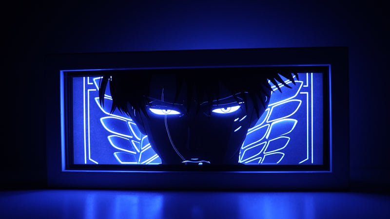 Attack on Titan anime light box with 3D paper carving and LED RGB lighting. Featuring Eren Yeager and the Colossal Titan, this custom handmade light box offers remote-controlled color options like blue, red, and white, perfect for bedroom or desk decor. Ideal for fans of the Survey Corps and humanity’s fight for survival, this light box brings the apocalyptic world of Attack on Titan to life