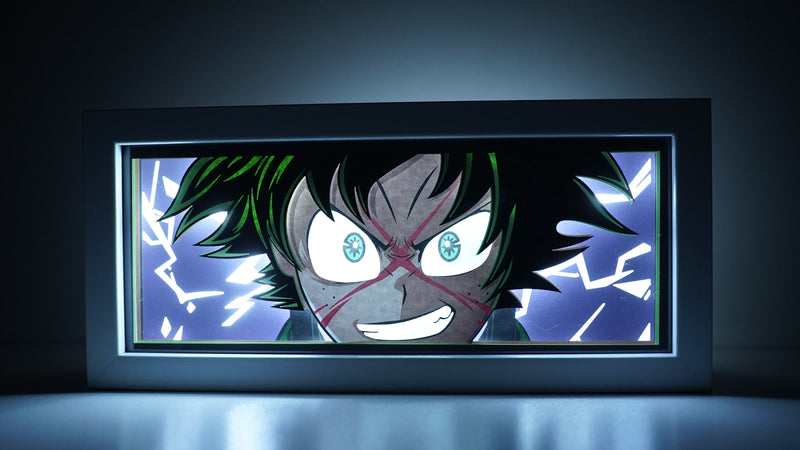 Custom My Hero Academia light box with 3D paper carving and RGB LED lights featuring Izuku "Deku" Midoriya. Perfect for anime gifts, Christmas decor, and Deku fans. Remote-controlled colors create an inspiring, heroic ambiance for any space. Ideal for holidays, birthdays, or special occasions, celebrating Deku’s One for All Quirk and his journey to becoming the greatest hero. A must-have for My Hero Academia fans looking to enhance their collection with a touch of Plus Ultra spirit