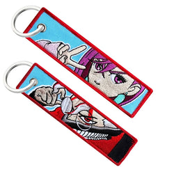 Dandadan jet tag embroidered keychain – premium anime merch featuring high-quality embroidery with bold designs inspired by the hit manga Dandadan. Showcasing iconic characters like Okarun, Momo Ayase, and Turbo Granny, this durable and lightweight keychain is perfect for anime fans, cosplay enthusiasts, and manga collectors. Use it as a bag tag, keychain accessory, or a unique anime gift. Elevate your Otaku collection with this Dandadan jet tag keychain today!