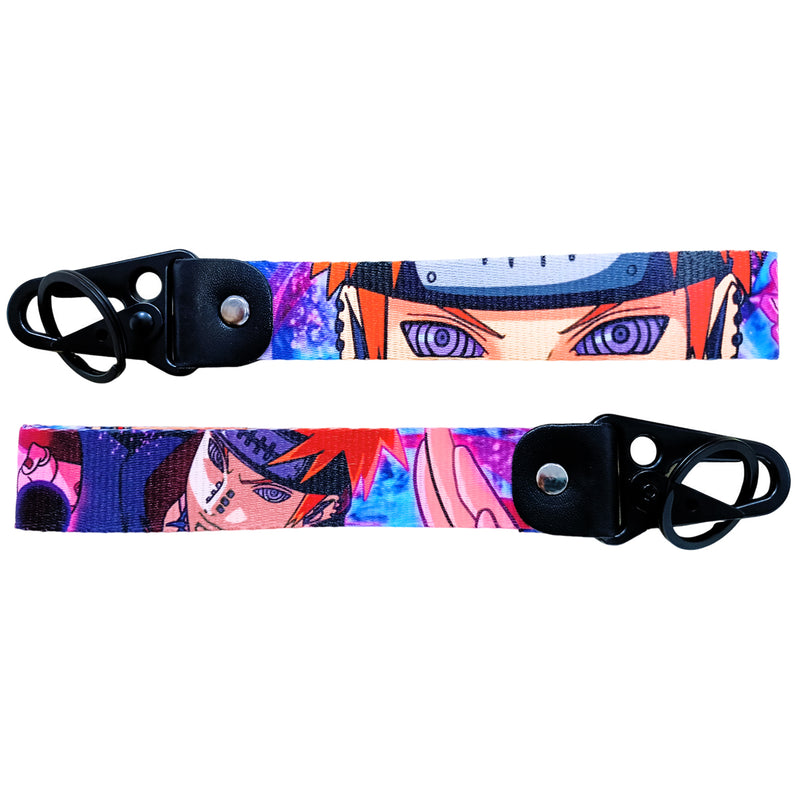 Epic Naruto JDM Lanyard Keychain featuring bold designs of Naruto, Sasuke, Sakura, and the Hidden Leaf Village emblem. Made from high-quality, durable fabric with vibrant, double-sided prints, this lanyard is perfect for holding keys, ID badges, or adding a touch of shinobi style to your backpack. Fusing the ninja adventures of Naruto with JDM flair, it’s a must-have accessory for anime lovers and car enthusiasts ready to carry the will of fire and their love for both worlds wherever they go.