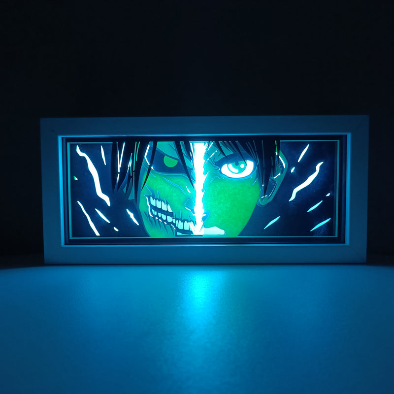 Attack on Titan anime light box with 3D paper carving and LED RGB lighting. Featuring Eren Yeager and the Colossal Titan, this custom handmade light box offers remote-controlled color options like blue, red, and white, perfect for bedroom or desk decor. Ideal for fans of the Survey Corps and humanity’s fight for survival, this light box brings the apocalyptic world of Attack on Titan to life