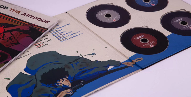 Cowboy Bebop 20th Anniversary Ultimate Edition collector’s box set featuring the complete anime series and movie on Blu-ray, three official Yoko Kanno soundtracks (Soundtrack 1, No Disc, and Blue), a 120-page hardcover art book with rare concept designs, all housed in a numbered retro vinyl-style flight case—this once-in-a-lifetime release is a true collector’s grail for those who grew up with Spike, Jet, Faye, Ed, and Ein; more than a box set, it’s a piece of anime history for fans who remember.