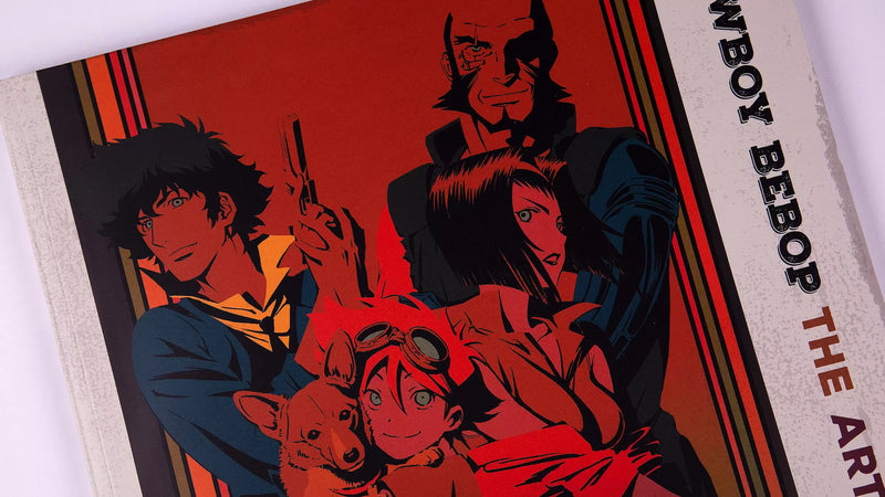 Cowboy Bebop 20th Anniversary Ultimate Edition collector’s box set featuring the complete anime series and movie on Blu-ray, three official Yoko Kanno soundtracks (Soundtrack 1, No Disc, and Blue), a 120-page hardcover art book with rare concept designs, all housed in a numbered retro vinyl-style flight case—this once-in-a-lifetime release is a true collector’s grail for those who grew up with Spike, Jet, Faye, Ed, and Ein; more than a box set, it’s a piece of anime history for fans who remember.