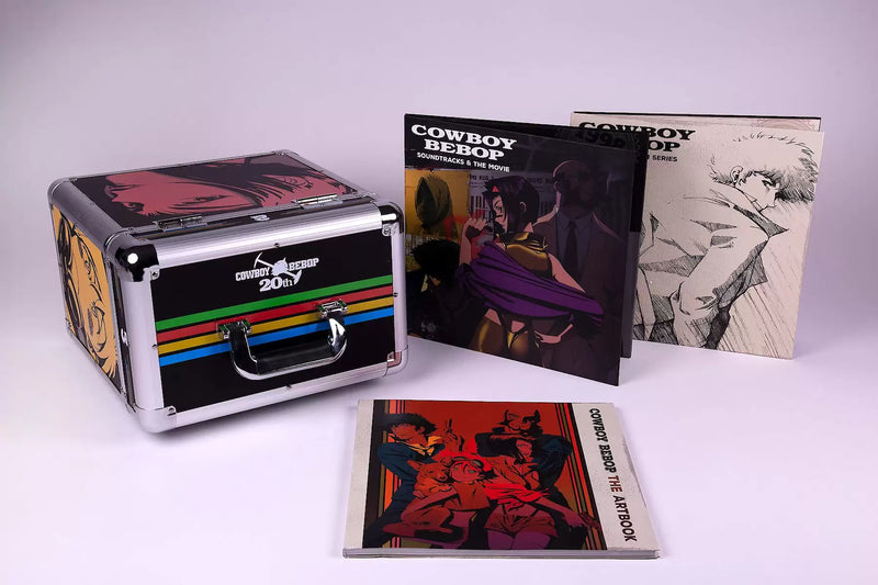 Cowboy Bebop 20th Anniversary Ultimate Edition collector’s box set featuring the complete anime series and movie on Blu-ray, three official Yoko Kanno soundtracks (Soundtrack 1, No Disc, and Blue), a 120-page hardcover art book with rare concept designs, all housed in a numbered retro vinyl-style flight case—this once-in-a-lifetime release is a true collector’s grail for those who grew up with Spike, Jet, Faye, Ed, and Ein; more than a box set, it’s a piece of anime history for fans who remember.
