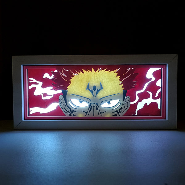 Jujutsu Kaisen anime light box with 3D paper carving and LED RGB lighting, featuring Yuji Itadori, Gojo Satoru, and Sukuna. This custom handmade light box brings the intense sorcery battles to life with remote-controlled color options, perfect for adding a supernatural vibe to any bedroom, desk, or anime-inspired space