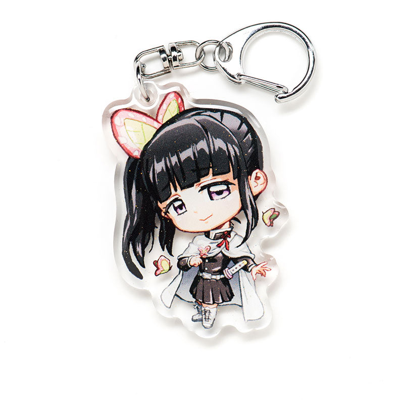 Buy Demon Slayer acrylic keychain featuring double-sided designs of Tanjiro, Nezuko, Zenitsu, Inosuke, and more. This premium 4-inch keychain with a 2.4-inch anime figure has vibrant, scratch-resistant colors and glitter epoxy coating. Ideal for keychains, backpacks, lanyards, and Ita bags. A unique limited edition design by Anime Crush, perfect for otaku collectors, manga lovers, and anime fans. Durable silver D-clasp for long-lasting use. Perfect anime gift.