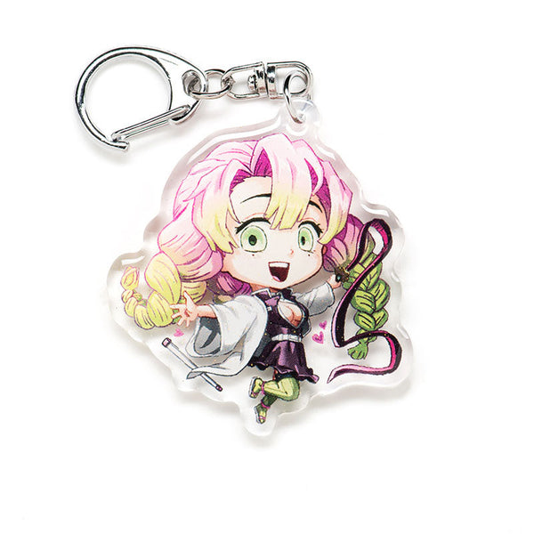 Buy Demon Slayer acrylic keychain featuring double-sided designs of Tanjiro, Nezuko, Zenitsu, Inosuke, and more. This premium 4-inch keychain with a 2.4-inch anime figure has vibrant, scratch-resistant colors and glitter epoxy coating. Ideal for keychains, backpacks, lanyards, and Ita bags. A unique limited edition design by Anime Crush, perfect for otaku collectors, manga lovers, and anime fans. Durable silver D-clasp for long-lasting use. Perfect anime gift.