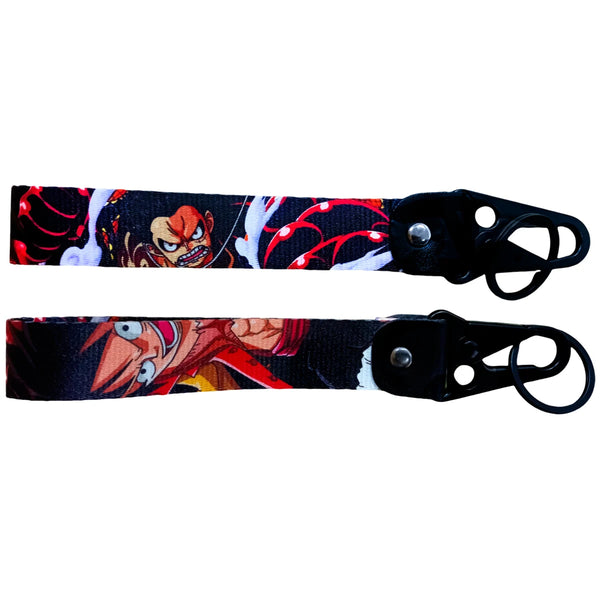 Adventurous One Piece JDM Lanyard Keychain featuring vibrant designs of Luffy, Zoro, Nami, Sanji, and the Straw Hat Pirates Jolly Roger. Made from durable, high-quality fabric with eye-catching, double-sided prints, perfect for keeping keys, ID badges, or adding flair to your backpack. Infusing the thrill of One Piece adventures with JDM style, this lanyard is a must-have for anime and car culture fans ready to sail the Grand Line and show off their passion.