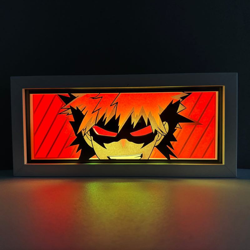 Custom My Hero Academia light box with 3D paper carving and RGB LED lights featuring Katsuki Bakugo. Perfect for anime gifts, Christmas decor, and Bakugo fans. Remote-controlled colors create an explosive, high-energy ambiance for any space. Ideal for holidays, birthdays, or special occasions, celebrating Bakugo’s fierce determination and explosive Quirk. A must-have for My Hero Academia fans looking to add a dynamic touch to their collection.