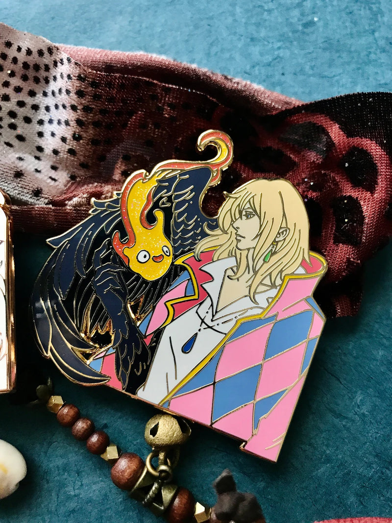 Howl Jenkins Pendragon Enamel Pin Collection – Limited Edition Collectibles Featuring Howl from Howl's Moving Castle. Premium Black Nickel Finish, Hard Enamel with Print Details, Numbered with Lasered Logo, Large 3 Inches (7.6 cm), Double Butterfly Clutch for Secure Attachment. Perfect Anime Merchandise for Howl's Moving Castle and Howl Jenkins Pendragon Fans, Collectors, and Enthusiasts. Includes Exclusive Howl Design, Anime Accessories, Otaku Gifts, Studio Ghibli Collectibles, Anime Convention Collectible