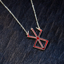 Sacrifice Necklace inspired by Berserk – handcrafted in 925 sterling silver featuring the iconic Brand of Sacrifice with enameled detailing. Lightweight design at 7 grams with a standard 50 cm chain, customizable lengths available. Perfect for Berserk anime and manga fans, Guts and Casca collectors, and Kentaro Miura enthusiasts. Comes with artisanal craftsmanship and premium gift packaging