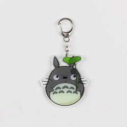 Studio Ghibli My Neighbor Totoro Acrylic Keychain – Featuring adorable chibi versions of Totoro and friends. Made from high-quality acrylic for a durable, lightweight design perfect for everyday use. Ideal for fans of Studio Ghibli and My Neighbor Totoro, this keychain adds a whimsical touch to keys, bags, or backpacks. A unique accessory for anime collectors and lovers of classic Ghibli films. Great as a gift or for adding charm to your collection of anime memorabilia.