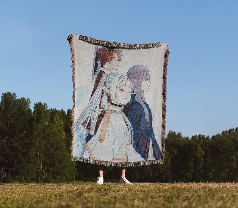 Frieren Beyond Journey’s End woven tapestry blanket featuring Frieren, Himmel, Fern, Stark, Heiter and Eisen, anime home decor by Anime Crush
