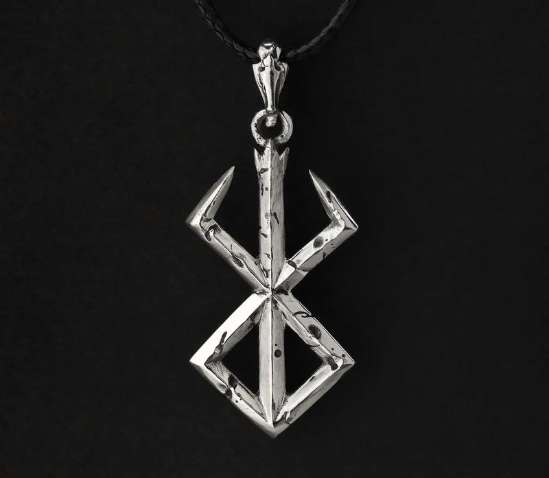 Handcrafted Brand of Sacrifice Pendant – Berserk-inspired jewelry made from 925 sterling silver. Intricate design, instantly recognizable to dark fantasy fans. Symbolic and mysterious, reflecting themes of resilience and fate. High-quality craftsmanship, detailed artistry. Pendant dimensions: 40x20 mm (1.57x0.78 inches), without bail. Perfect for pairing with your favorite chain or leather cord. Ideal for Berserk fans, anime collectors, dark-themed jewelry enthusiasts, and unique gifts.