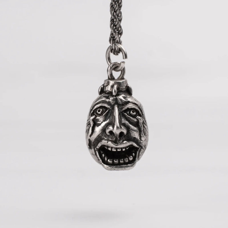 Handcrafted Behelit Jewelry – Berserk-inspired pendant necklace featuring Guts, Griffith, and God Hand symbolism with double-sided design: awakened face and sleeping face. High-quality pewter, hand-cast, unique imperfections, 22-inch (55.9 cm) stainless steel ball chain, secure lobster claw closure. Perfect for Berserk fans, anime collectors, dark fantasy lovers, cosplay, and unique gifts. Symbolic, collectible, artisan design.