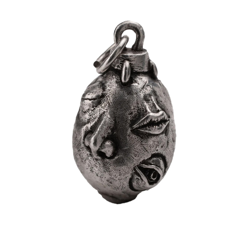 Handcrafted Behelit Jewelry – Berserk-inspired pendant necklace featuring Guts, Griffith, and God Hand symbolism with double-sided design: awakened face and sleeping face. High-quality pewter, hand-cast, unique imperfections, 22-inch (55.9 cm) stainless steel ball chain, secure lobster claw closure. Perfect for Berserk fans, anime collectors, dark fantasy lovers, cosplay, and unique gifts. Symbolic, collectible, artisan design.