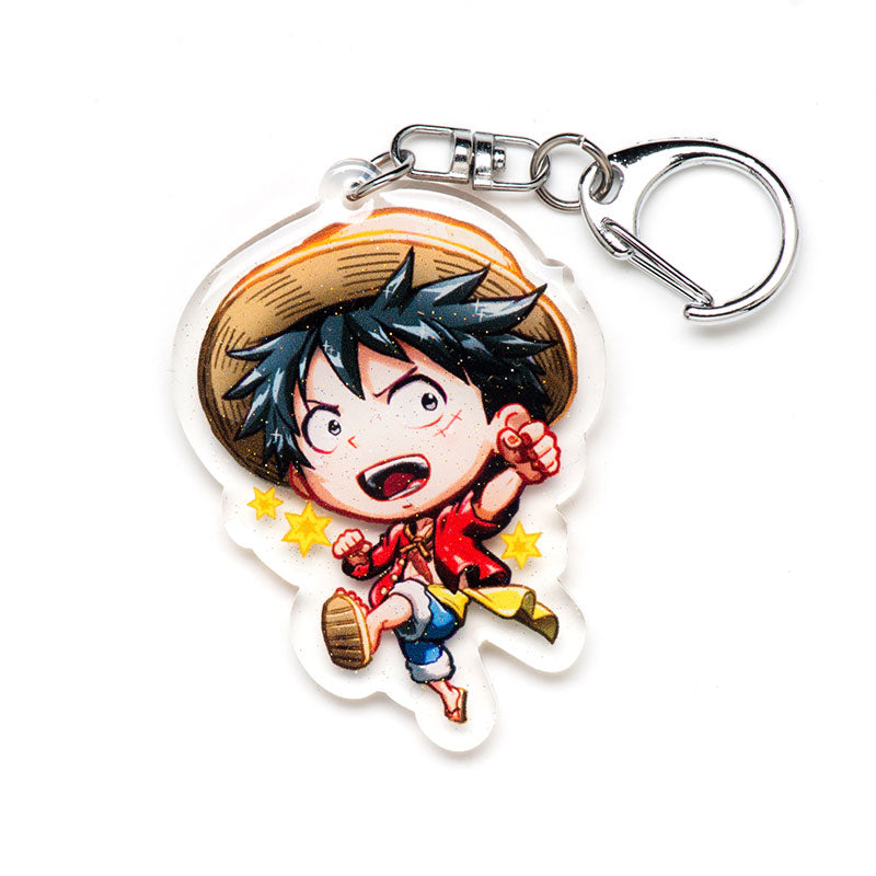 Limited edition One Piece acrylic keychain featuring double-sided designs of Luffy, Zoro, and Nami. Bold, vibrant colors with a scratch-resistant finish and glitter epoxy coating. Perfect for decorating backpacks, lanyards, and Ita bags. Durable silver D-clasp ensures long-lasting use. A must-have collectible and gift for anime fans and One Piece enthusiasts!