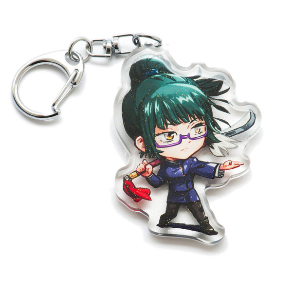 Must-have Jujutsu Kaisen acrylic keychain with double-sided designs of Yuji, Gojo, and Nobara. Vibrant, scratch-resistant colors and glitter epoxy coating make it stand out. Perfect for backpacks, lanyards, and Ita bags. Durable silver D-clasp ensures long-lasting quality. A limited edition collectible and the perfect gift for anime fans and collectors