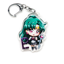 Charming Sailor Moon acrylic keychain with double-sided designs of Sailor Moon, Luna, and Tuxedo Mask. Featuring vibrant, scratch-resistant colors and a glitter epoxy coating. Perfect for accessorizing backpacks, lanyards, and Ita bags. Durable silver D-clasp ensures long-lasting quality. A magical collectible and the ideal gift for Sailor Moon fans and anime lovers!