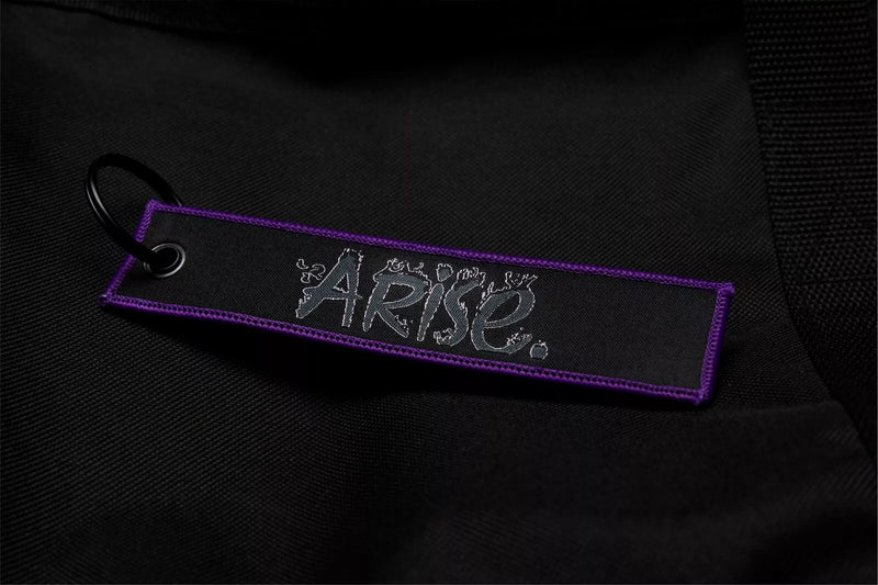 Solo Leveling: Ore dake Level Up na Ken Embroidered Jet Tag featuring Sung Jin-Woo Arise , the Shadow Monarch symbol, and his iconic dual daggers. Crafted from durable, high-quality materials with bold, double-sided embroidery, this jet tag perfectly captures the intense action and dark fantasy of Solo Leveling. Perfect for keys, backpacks, or cars, this collectible is a must-have for fans of Sung Jin-Woo’s journey and anime enthusiasts who love epic leveling-up stories. Show off your love for Solo Leveling