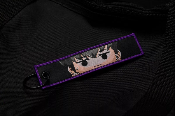 Solo Leveling: Ore dake Level Up na Ken Embroidered Jet Tag featuring Chibi Sung Jin-Woo, the Shadow Monarch symbol, and his iconic dual daggers. Crafted from durable, high-quality materials with bold, double-sided embroidery, this jet tag perfectly captures the intense action and dark fantasy of Solo Leveling. Perfect for keys, backpacks, or cars, this collectible is a must-have for fans of Sung Jin-Woo’s journey and anime enthusiasts who love epic leveling-up stories. Show off your love for Solo Leveling